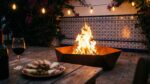 Hexagonal corten steel fire pit glowing on outdoor patio with evening lighting
