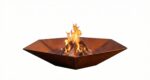 Isolated Corten steel hexagonal fire pit Diamond Hex on white background.